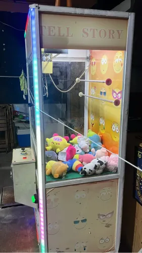 Máquina de pegar urso