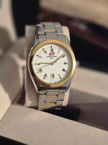 VICTORINOX | SWISS ARMY | DHC + | 1994<br>AÇO | OURO