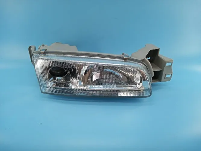 Farol  Mazda 626  Ano:1992/1997 Marca:TYC