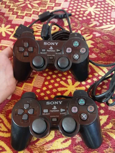 Controles de Ps2 originais bem conservados
