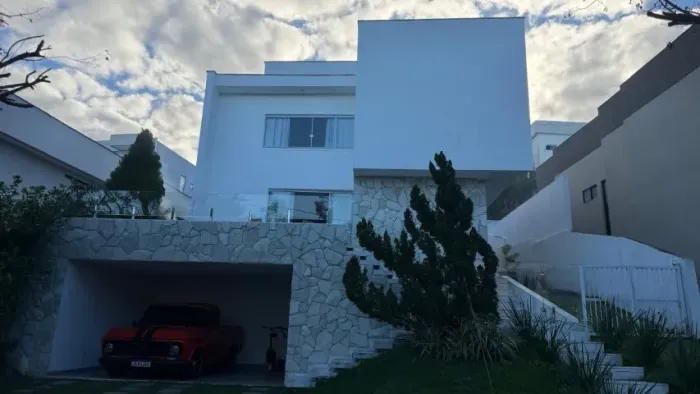Alugo Casa 4/4 suítes com piscina no Alphaville Litoral Norte 2
