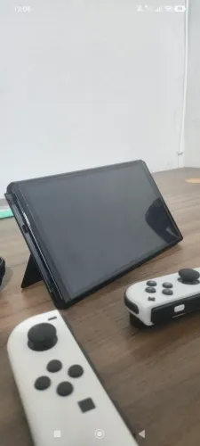 Nintendo Switch OLED Desbloqueado + 128GB + Case - R$ 2.400