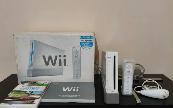 Nintendo Wii na caixa com jogos ( faço envio pela Olx )