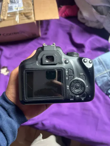 CANON T100