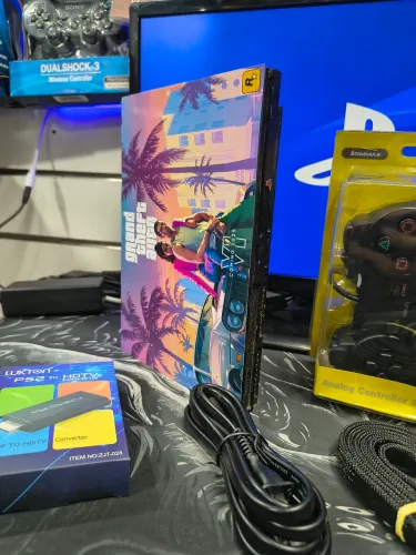 Vendo Ps2 Slim Tunado com entrega grátis leia a descrição
