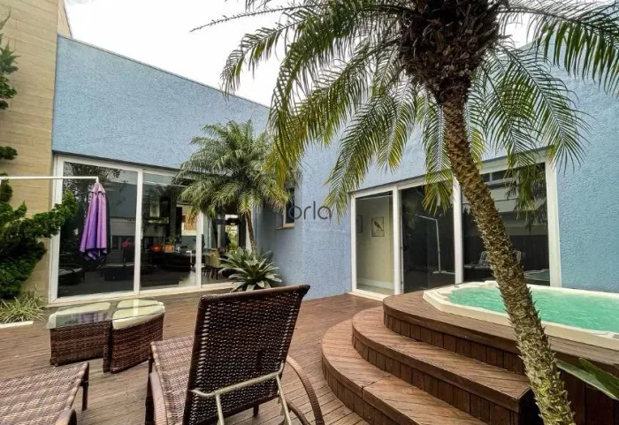 Casa com 4 suítes e pátio nos fundos no Condomínio Enseada, Xangri-Lá REF: CA0298
