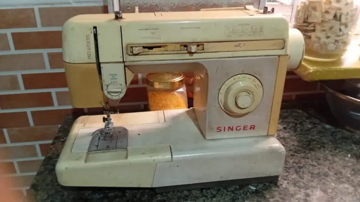 Vende máquina de costura 