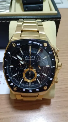 Relógio oriente dourado cronógrafo