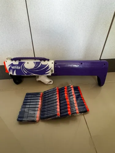 Nerf que vira uma bolsa +50 balas