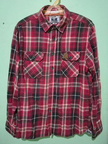 Camisa Xadrez manga longa.