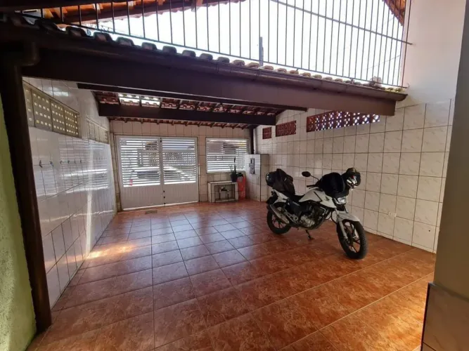 Casa com 3 dormitórios à venda, 105 m² por R$ 425.000,00 - Caiçara - Praia Grande/SP
