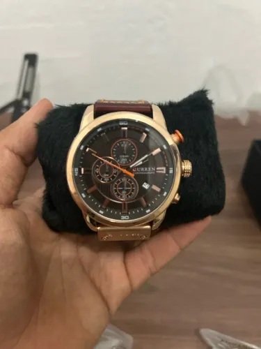 -Relógio Curren Masculino, em couro e caixa de aço.