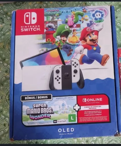 Nintendo Switch OLED semi novo leia a descrição