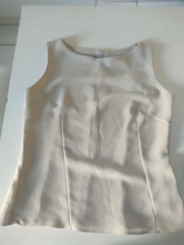 Blusa linda pra trabalho também de marca .