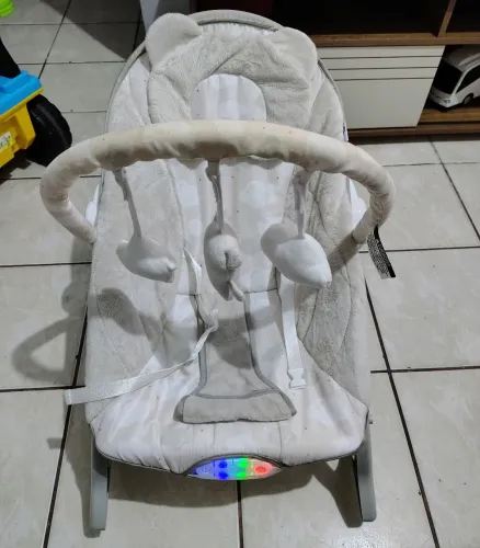 Cadeira de descanso musical Urso polar da maxi baby