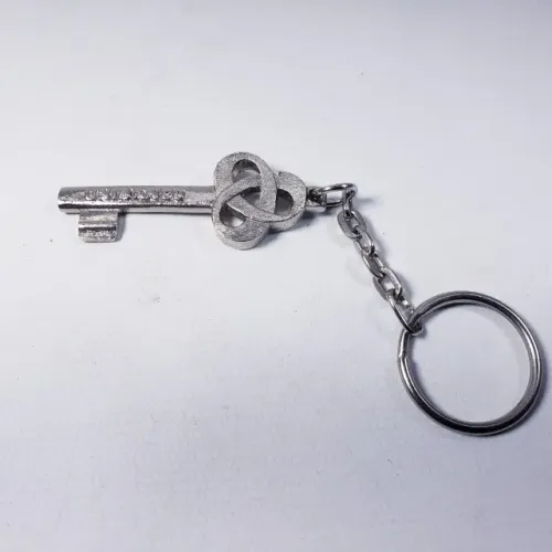 Antigo chaveiro Banco Unibanco em metal
