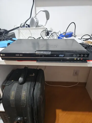 Vendo gravador de DVD LG modelo RH397H em pleno funcionamento.