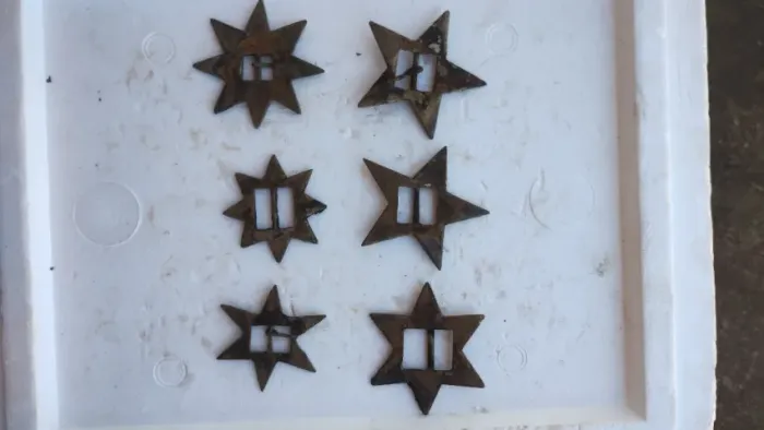 Fivelas estrela em níquel usadas