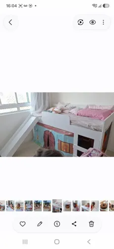 Cama infantil com escorrega.