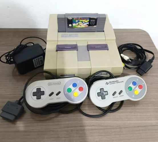 Vendo super Nintendo completo funcionando perfeitamente .