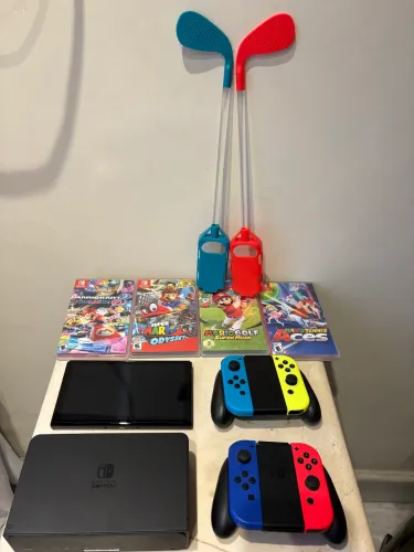 Nintendo Switch V1 32GB + 2 controles + 2 club de golf + 4 jogos originais