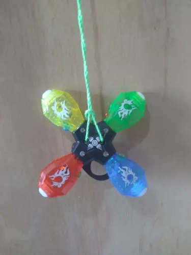 Spiner com corda que brilha