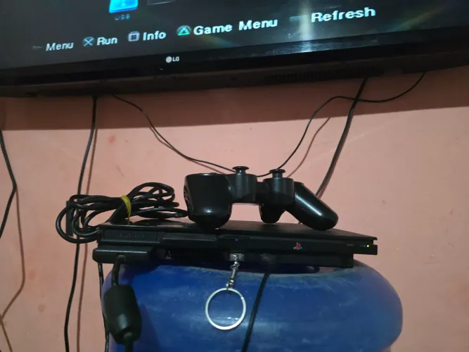 PlayStation 2 com 2 controle e 20 jogos