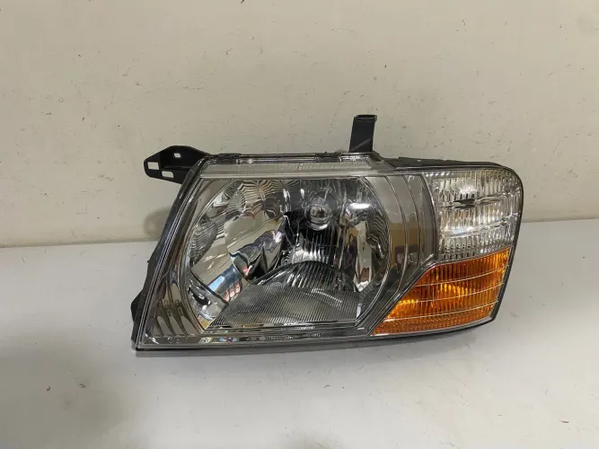Farol esquerdo Pajero Full 2000/2001/2002/2003/2004/2005/2006/2007
