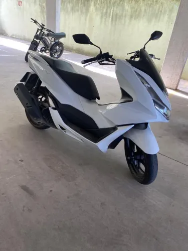Vendo ou troco por biz pcx nova ,única dona