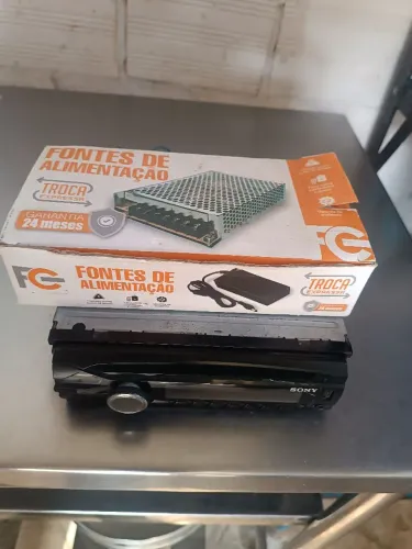 CD player e fonte carregador