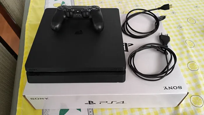 PS4 slim 1TB completo na caixa original - muito conservado 