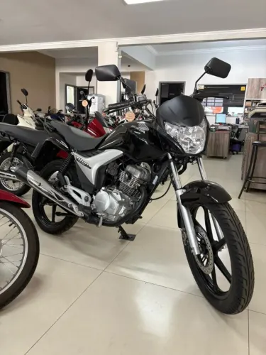 Titan 150 2009 super conservada