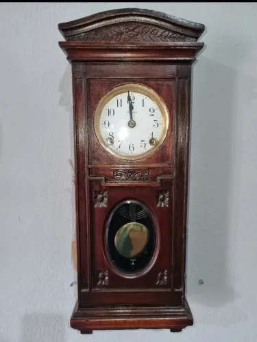 Antigo relógio de parede Ansonia. ( 50 cm)
