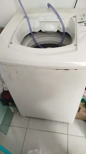 Máquina de lavar com defeito 