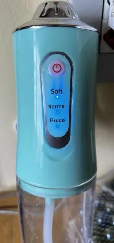 Irrigador Oral Portátil / sem uso / verde