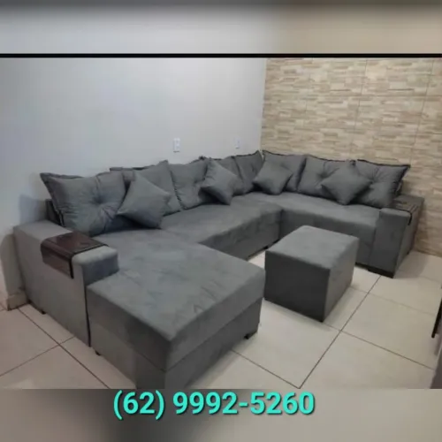 Sofá de canto com chaise grande cinza com puff