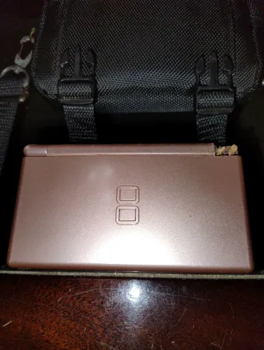 Nintendo DS lite rose defeito
