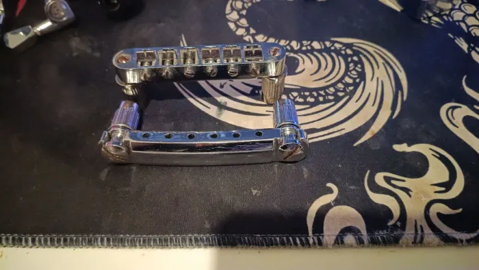Ponte de guitarra les paul