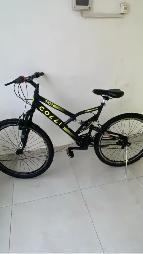 Vendo bicicleta nova comprei na loja não tem uma semana Colli aro 26