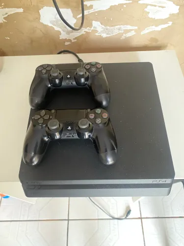Vendo ps4 2 controles 1t de armazenamento videogame completo
