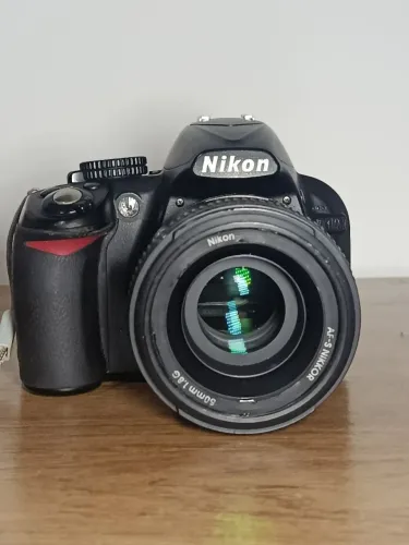 Nikon D3100+Lente 50mm Nikon+bag P/Trasporte e flash yougnuo