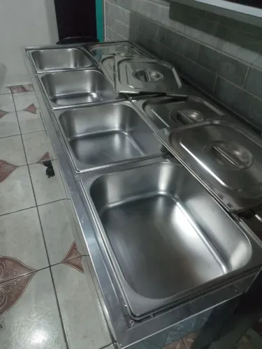 Vendo buffet térmico 110 wts com 8 cubabas, e rodinhas, apenas 2 meses de uso, e um fogão 