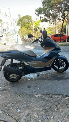 único dono moto muito nova