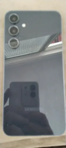 Celular Samsung A 55 128g memória  com carregador e cabo. 1,.400,00