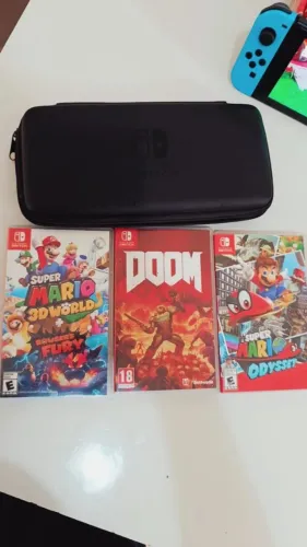 Nintendo Switch V2 + 3 Jogos + Acessórios (Estado de Novo)