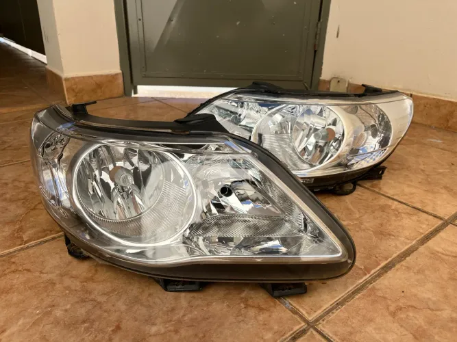 Par de faróis Gol/Saveiro G5 original ARTEB