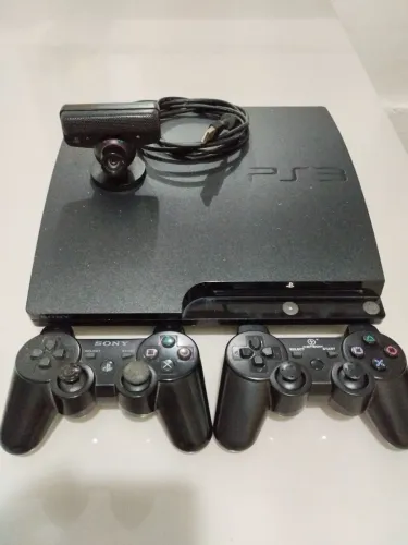 PS3 com 2 controle e câmera