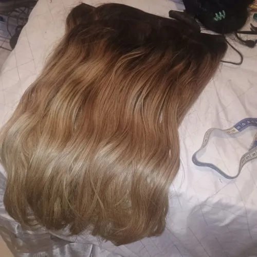 Cabelo loiro  3 telas 55 cm 305 gramas 1.300,00