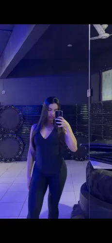 Macacão fitness dlk preto c/ detalhe verde