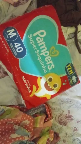 Estou vendendo esses pacotes de fralda tamanho M, faço troca por fralda g ou xg